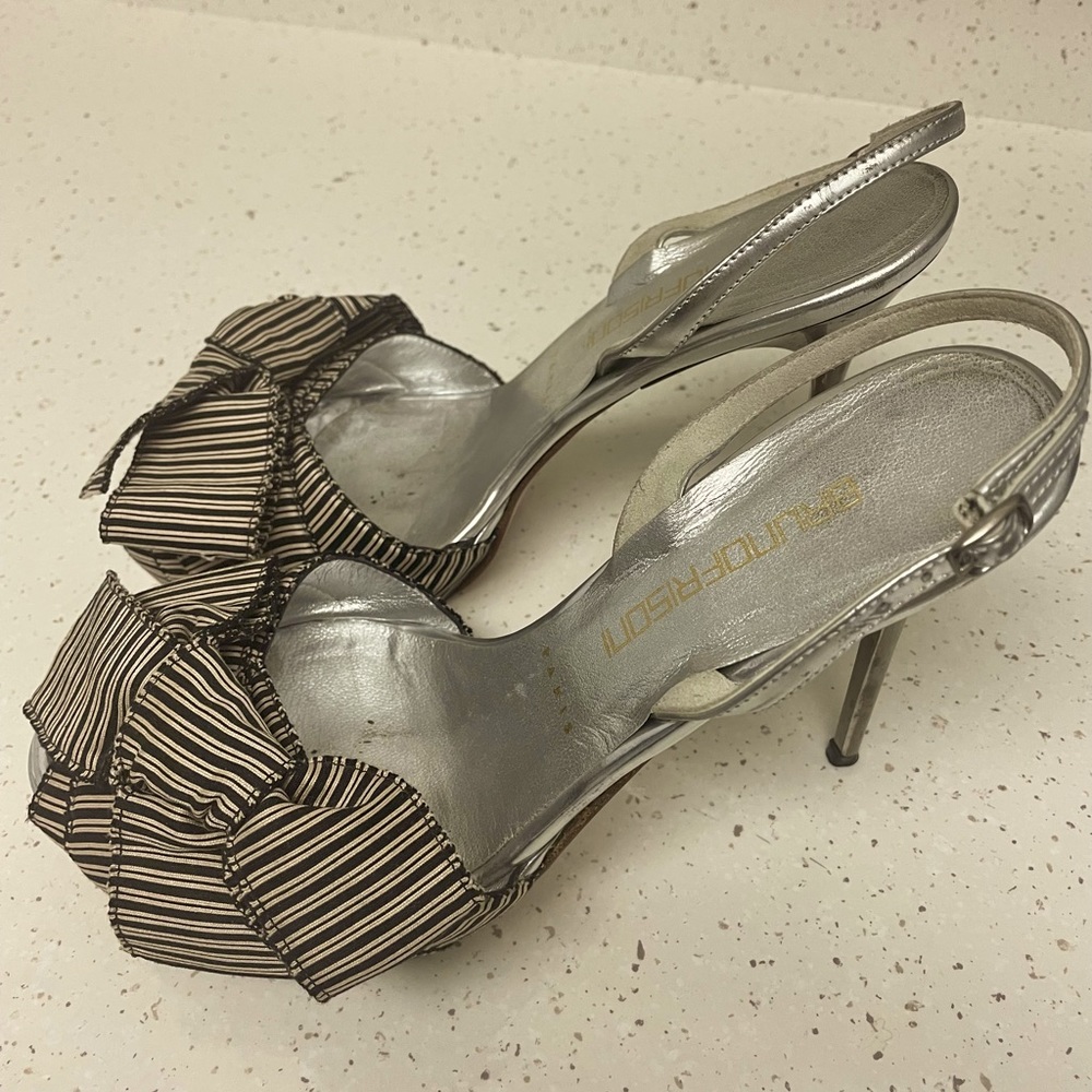 Stripped heels with bows.